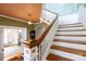 Inviting foyer with hardwood staircase and vintage charm, showcasing the home's character at 143 Reid St, Rock Hill, SC 29730