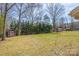 Large backyard features a shed and mature trees offering a private and serene outdoor space at 1630 26Th Ne St, Hickory, NC 28601