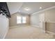 This bedroom has carpet, one window, and a storage rack on the wall at 1891 Felts Pkwy, Fort Mill, SC 29715