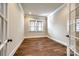 Bright office space featuring hardwood floors and a window with natural light at 1891 Felts Pkwy, Fort Mill, SC 29715