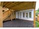 Basement area with access to stairs and a covered porch at 1922 Hamorton Pl, Charlotte, NC 28205