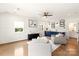 Bright open living room with hardwood floors and a wet bar area at 1922 Hamorton Pl, Charlotte, NC 28205