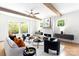Bright living room with exposed beams, fireplace, and modern decor at 1922 Hamorton Pl, Charlotte, NC 28205