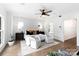 Bright main bedroom with hardwood floors, a ceiling fan, and modern decor at 1922 Hamorton Pl, Charlotte, NC 28205