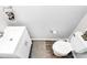 Well-lit powder room with modern fixtures and a clean, minimalist design at 19613 Feriba Pl, Cornelius, NC 28031