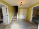 Entryway with staircase, light fixture, and a double door closet at 1968 12Th Street Ne Pl, Hickory, NC 28601