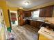 Cozy kitchen with wooden cabinets, white countertops, and ample natural light at 1968 12Th Street Ne Pl, Hickory, NC 28601