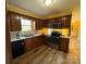 Features stainless steel appliances, wood cabinets, and a window over the sink at 1968 12Th Street Ne Pl, Hickory, NC 28601