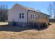 View of the deck showcases its wooden structure and access to the backyard at 2037 Powerline Dr, Gastonia, NC 28054