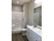 Bathroom featuring dual sink vanity and shower with clear doors at 2037 Powerline Dr, Gastonia, NC 28054