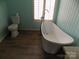Bright bathroom features a modern soaking tub and stylish fixtures, creating a relaxing spa-like atmosphere at 2130 Babbling Brook Ln, Gastonia, NC 28052