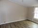 Bedroom with natural light, neutral walls, and modern flooring at 2130 Babbling Brook Ln, Gastonia, NC 28052