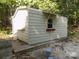 Exterior shot of the metal outbuilding in the rear of the property at 2130 Babbling Brook Ln, Gastonia, NC 28052