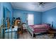 Bright bedroom with a ceiling fan, natural light, and charming decor at 214 Harrel St, Salisbury, NC 28144