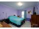 Comfortable bedroom featuring ample natural light and a neutral color palette at 214 Harrel St, Salisbury, NC 28144