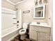 Full bathroom with shower over tub and single sink vanity at 2180 Grace Church Rd, Salisbury, NC 28147