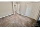 Carpeted bedroom featuring a double door closet at 2180 Grace Church Rd, Salisbury, NC 28147