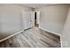 Bedroom featuring luxury vinyl plank flooring and a double door closet at 2180 Grace Church Rd, Salisbury, NC 28147