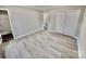 Spacious bedroom featuring luxury vinyl plank flooring and a double door closet at 2180 Grace Church Rd, Salisbury, NC 28147