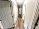 Hallway with multiple closets and neutral walls at 2180 Grace Church Rd, Salisbury, NC 28147