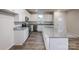Modern kitchen with stainless steel appliances, granite countertop, and a stylish island at 2583 Watson Dr, Lancaster, SC 29720