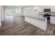 Modern kitchen and living room with sleek appliances, island and open layout, perfect for entertaining at 2583 Watson Dr, Lancaster, SC 29720