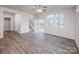 Bright living room with patio access, large windows, and stairway access at 2583 Watson Dr, Lancaster, SC 29720