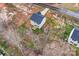 Overhead perspective of a home featuring light siding, a dark roof, and a driveway, captured from above at 2591 Watson Dr, Lancaster, SC 29720