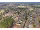 Aerial view showcases a well-established neighborhood with tree-lined streets and diverse home styles at 2591 Watson Dr, Lancaster, SC 29720