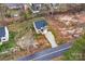 Aerial shot of the home showing the driveway, roof, landscaping, and nearby houses at 2591 Watson Dr, Lancaster, SC 29720