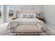 Comfortable main bedroom with bench seat and side tables at 276 Gilead Rd, Huntersville, NC 28078