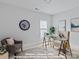 Bedroom shown as office with large clock and a glass desk at 276 Gilead Rd, Huntersville, NC 28078