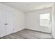 Bright bedroom featuring a window and closet at 2822 Woodlands Creek Dr, Monroe, NC 28110