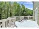 Exterior of the deck overlooking a lush, tree-filled backyard at 2822 Woodlands Creek Dr, Monroe, NC 28110