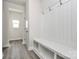 Mudroom with bench and coat hooks, offering practical storage and organization at 2822 Woodlands Creek Dr, Monroe, NC 28110