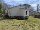 View of the backyard showing the exterior of the house at 3703 Crawford St, Gastonia, NC 28052