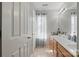 This bathroom is well-lit and features a long vanity and sink, linen storage, and ample storage at 3812 Caldwell Ridge Pkwy, Charlotte, NC 28213