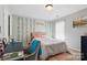 Cozy bedroom with decor, natural light, and a comfortable bed and desk setup, ideal for students at 3812 Caldwell Ridge Pkwy, Charlotte, NC 28213