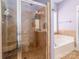 Bathroom showcasing glass door shower and soaking tub at 3816 Sonoma Way, Monroe, NC 28110