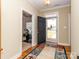 Inviting entryway with a view into a sunlit room, showcasing an open and airy floor plan at 3816 Sonoma Way, Monroe, NC 28110