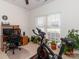 Exercise room featuring a bright window with blinds, carpeted flooring, and exercise equipment at 3816 Sonoma Way, Monroe, NC 28110