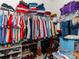 Walk-in closet with shelving, hanging rods, and ample storage space at 3816 Sonoma Way, Monroe, NC 28110