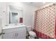 Bathroom with single vanity and shower with shower curtain at 3870 County Down Ave, Kannapolis, NC 28081