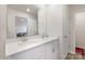 The bathroom has a double sink vanity with a large mirror and door leading to bedroom at 3870 County Down Ave, Kannapolis, NC 28081