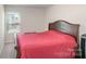 Bedroom with a large bed and plenty of natural light at 3870 County Down Ave, Kannapolis, NC 28081