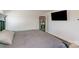 This bedroom features a large bed, TV and bookshelf at 3870 County Down Ave, Kannapolis, NC 28081