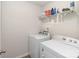 Laundry room with white washer and dryer at 3870 County Down Ave, Kannapolis, NC 28081
