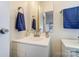 Bright bathroom featuring a white vanity and modern faucet at 405 Briarwood Ct, Mount Holly, NC 28120