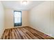 Empty bedroom with wood floors, and natural lighting at 405 Briarwood Ct, Mount Holly, NC 28120