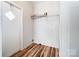 Functional laundry room space with wood-look floors at 405 Briarwood Ct, Mount Holly, NC 28120